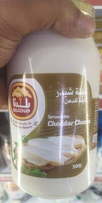 Spreadable cheddar cheese